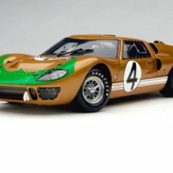 1966 Ford GT-40 MK II Le Mans #4, Gold - Shelby Collectibles SC414G - 1/18 Scale Diecast Car